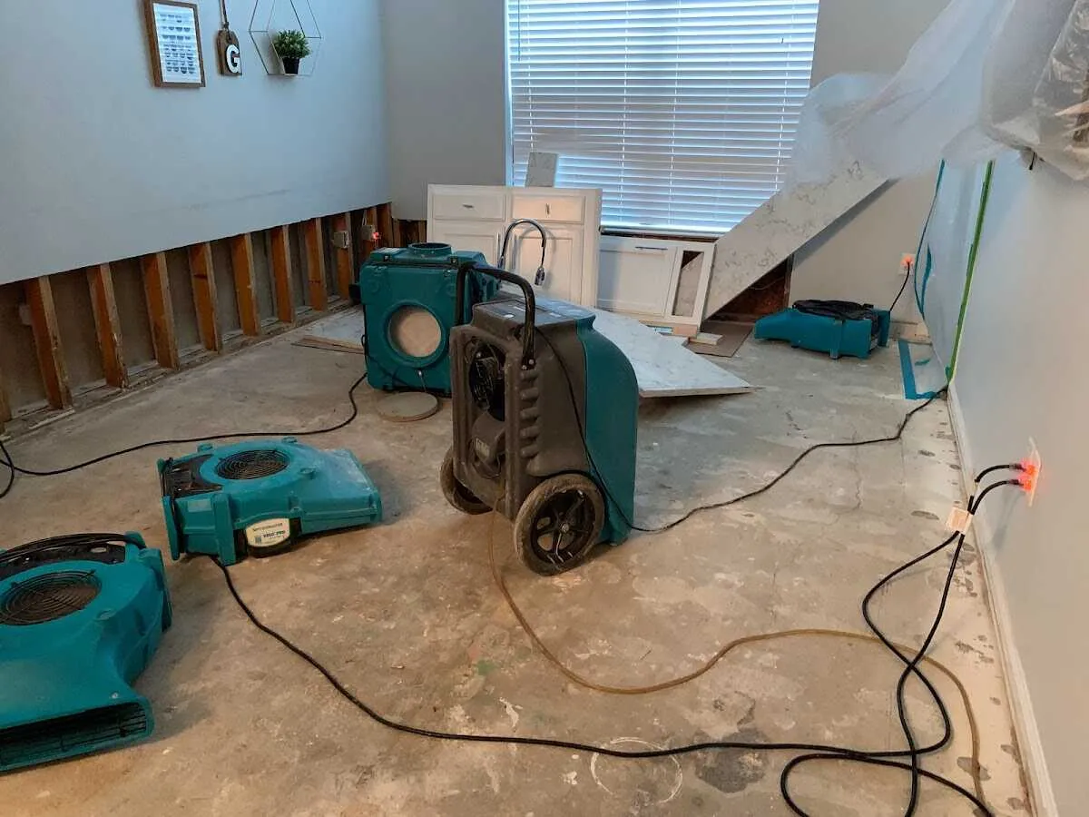 Dehumidifier in flood-cut room for Water Damage Restoration in Garden City